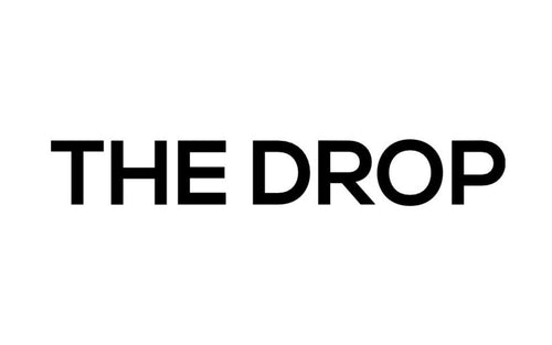 Black text 'THE DROP' on a white background
